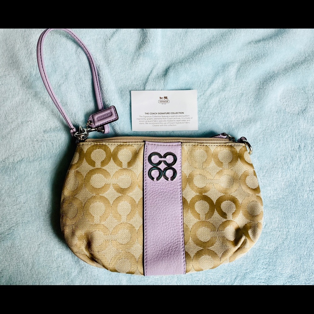 Coach wristlet with leather trim! So cute!